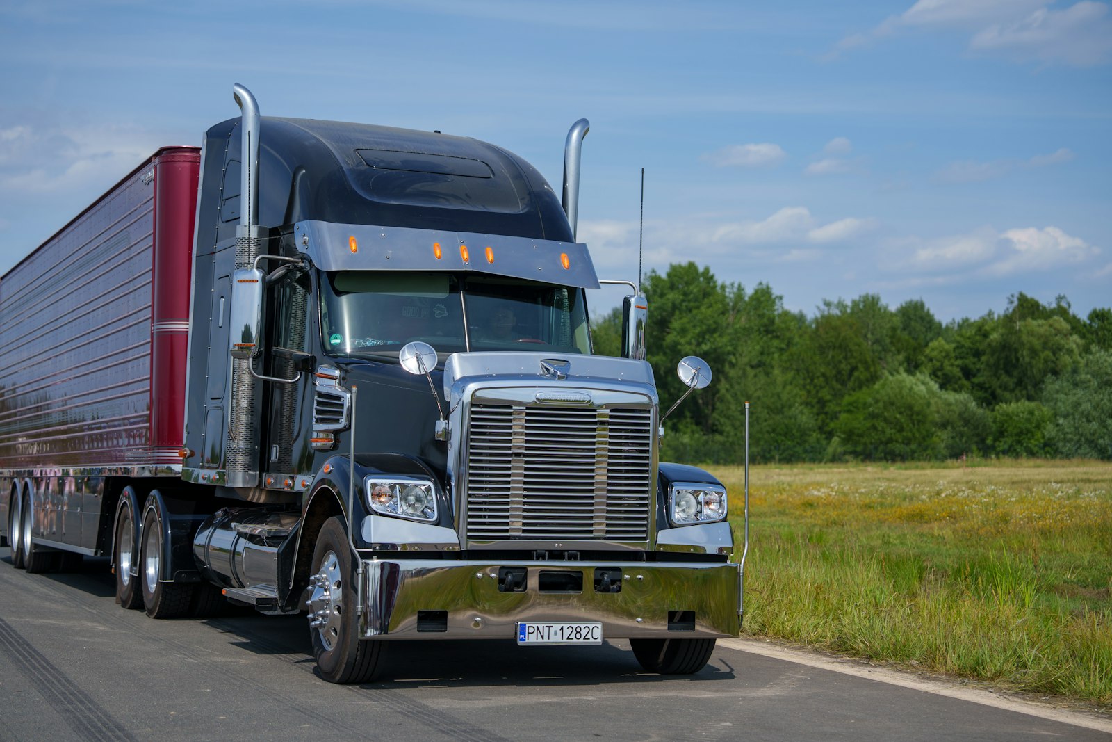Semi truck on the road for a logistics and transportation company